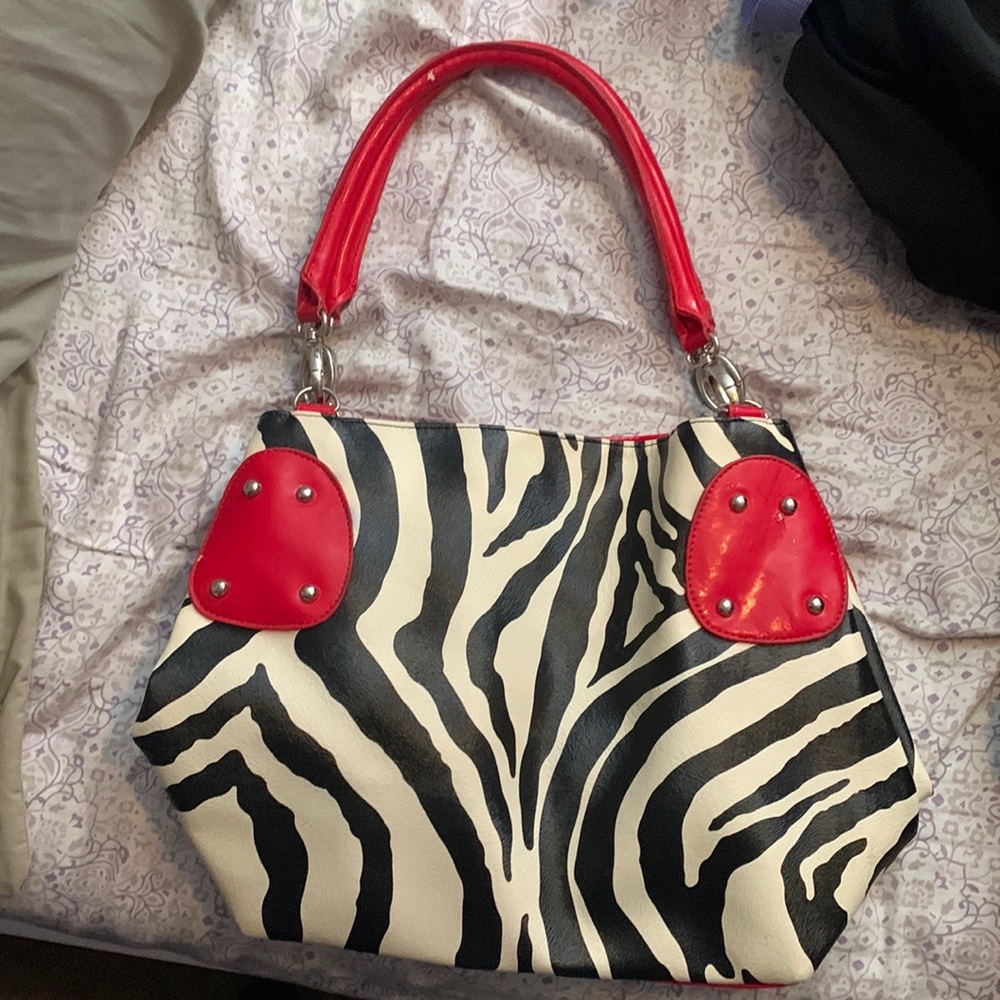 Zebra print red purse